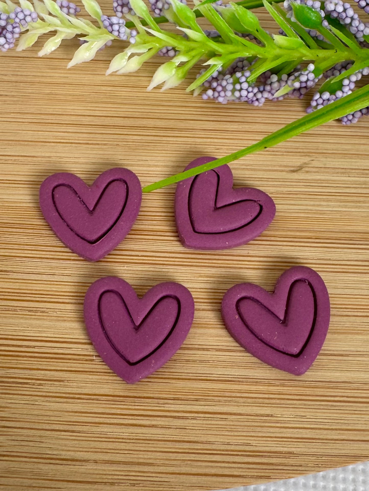 Purple Outlined Heart Stud