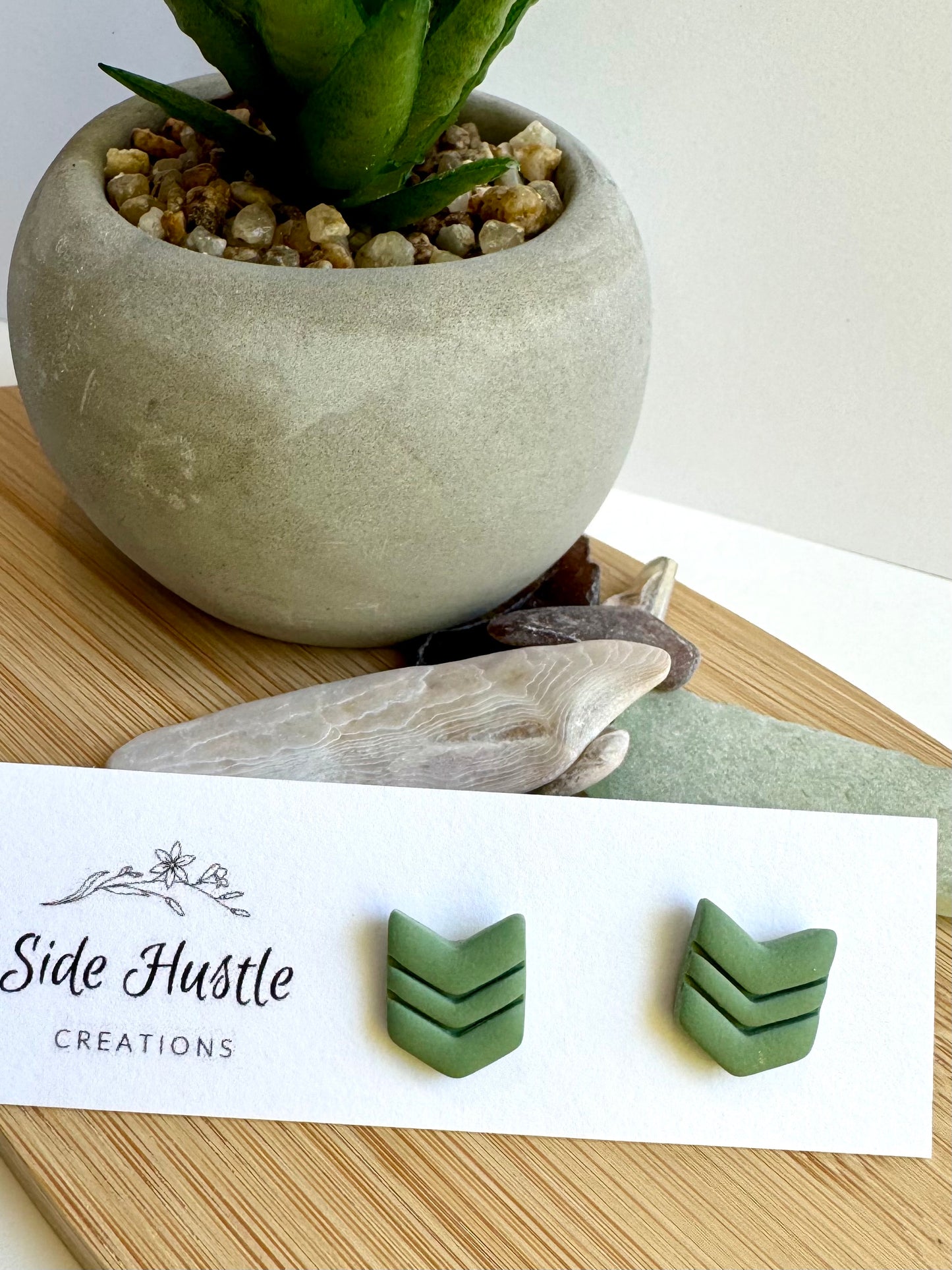 Green Chevron studs￼